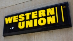 A Western Union sign is seen in New York March 28, 2009. Picture taken March 28, 2009. REUTERS/Eric Thayer (UNITED STATES BUSINESS SOCIETY)